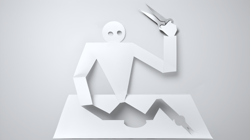 A man cuts himself out of a sheet of paper